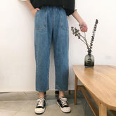 Pantalones holgados de mezclilla azul con bolsillos delanteros grandes y cintura elástica